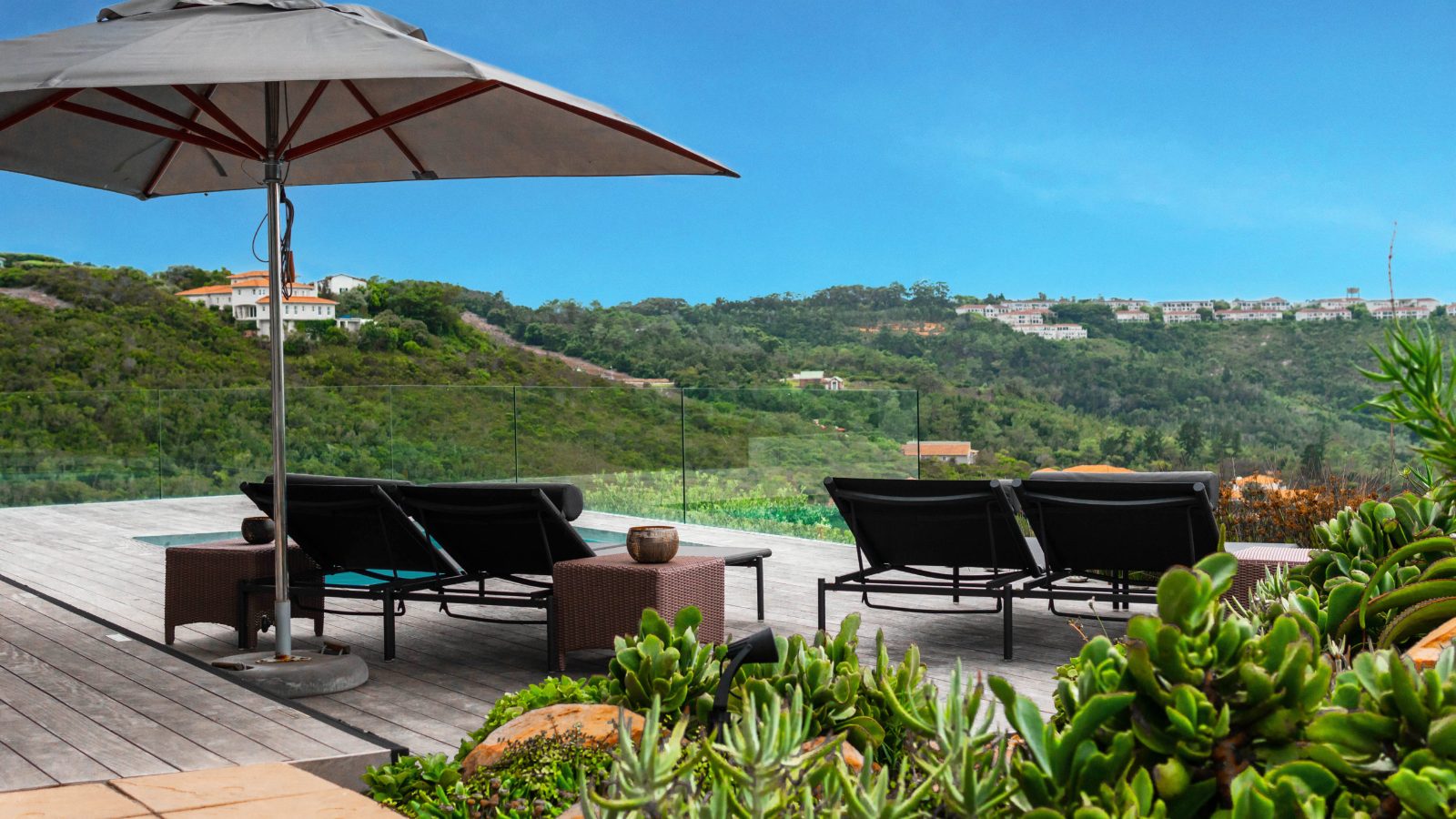 Real estate photography: poolside deck with valley view